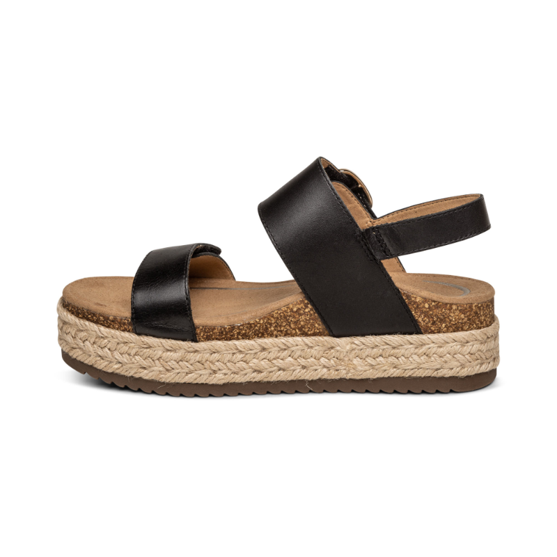 Aetrex Vania black leather platform sandal with cork footbed and braided jute midsole.