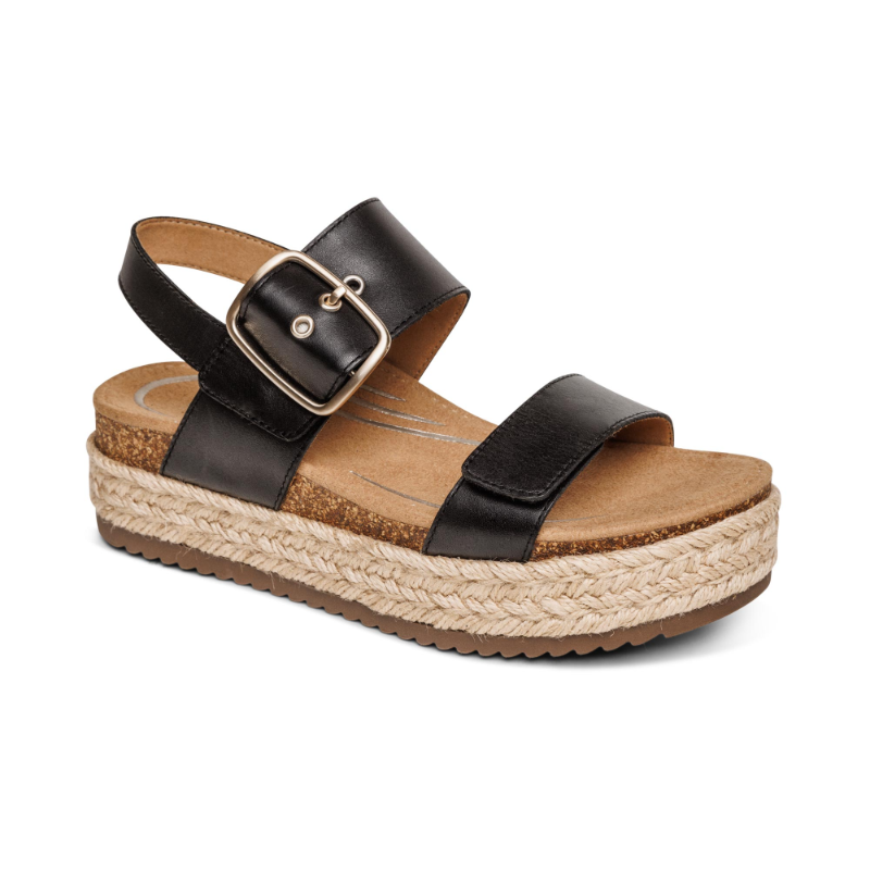 Aetrex Vania black leather sandal with two straps, adjustable buckle, and jute espadrille platform
