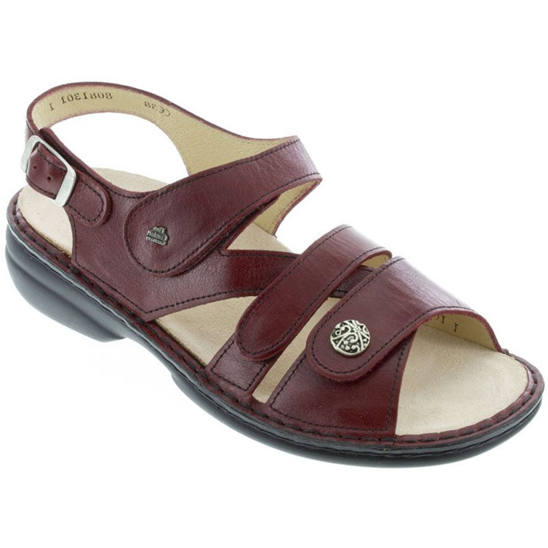 Finn Comfort Gomera-S women's casual sandal in burgundy leather with adjustable Velcro straps and cushioned footbed.