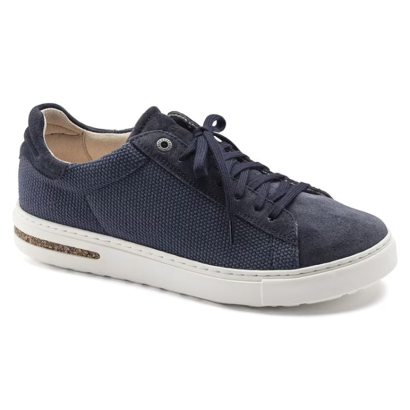 Birkenstock Bend casual sneakers in navy blue with suede toe cap and cork-accent sole.