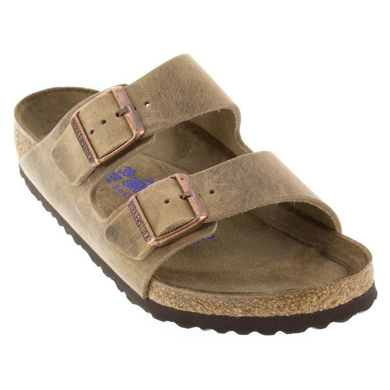 Birkenstock Arizona Soft Footbed sandals with brown suede straps and copper buckles