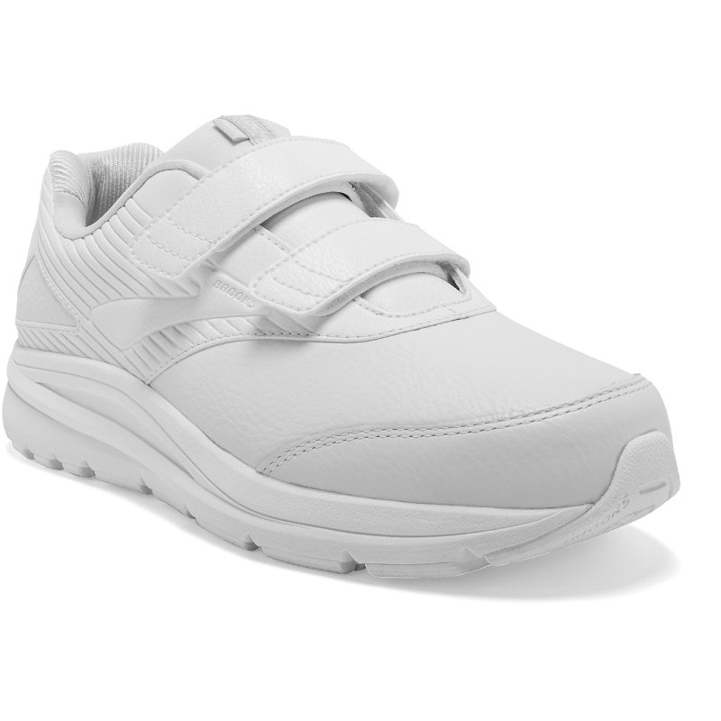 Brooks Addiction Walker V-Strap 2 women's athletic shoes in white; white leather upper with Velcro straps.