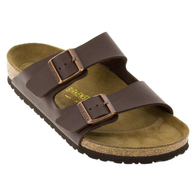 Birkenstock Arizona sandals, brown leather double straps with copper buckles and cork footbed.