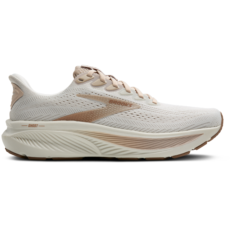 Brooks Ghost 17 athletic shoes in cream with blush accents and textured midsole.
