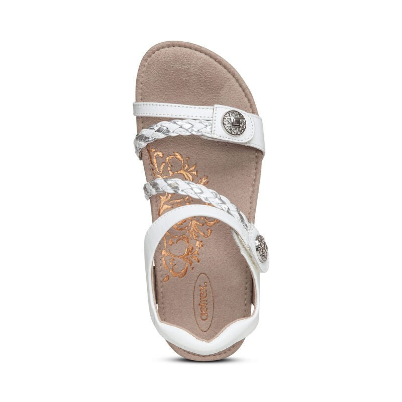 Aetrex Jillian casual sandal in white with braided straps and metallic gold monogram on beige insole.