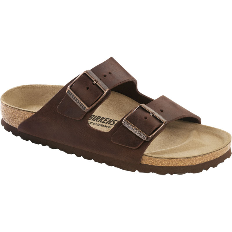 Birkenstock Arizona casual sandals in brown leather with two buckled straps and cork footbed.