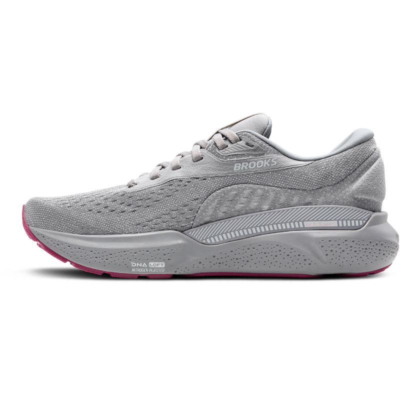 Brooks Adrenaline GTS 24 athletic shoes in gray with pink outsole detailing.