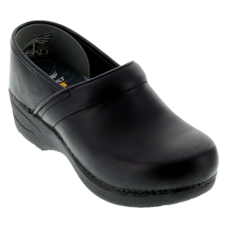 Dansko XP 2.0 work clog; black leather slip-on with wedge heel