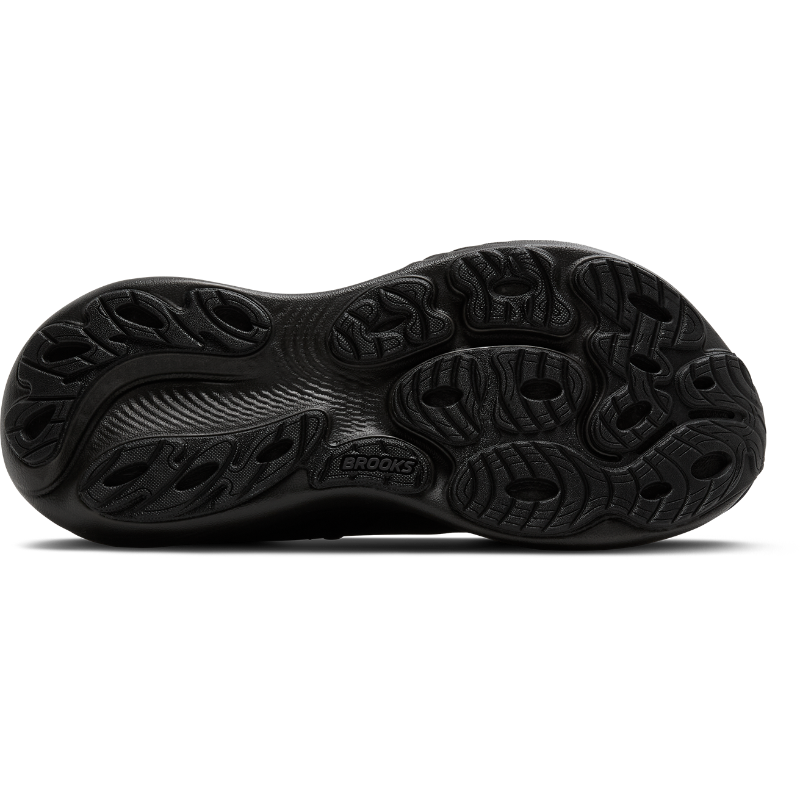 Brooks Adrenaline GTS 25 athletic shoes with black outsole and textured tread pattern