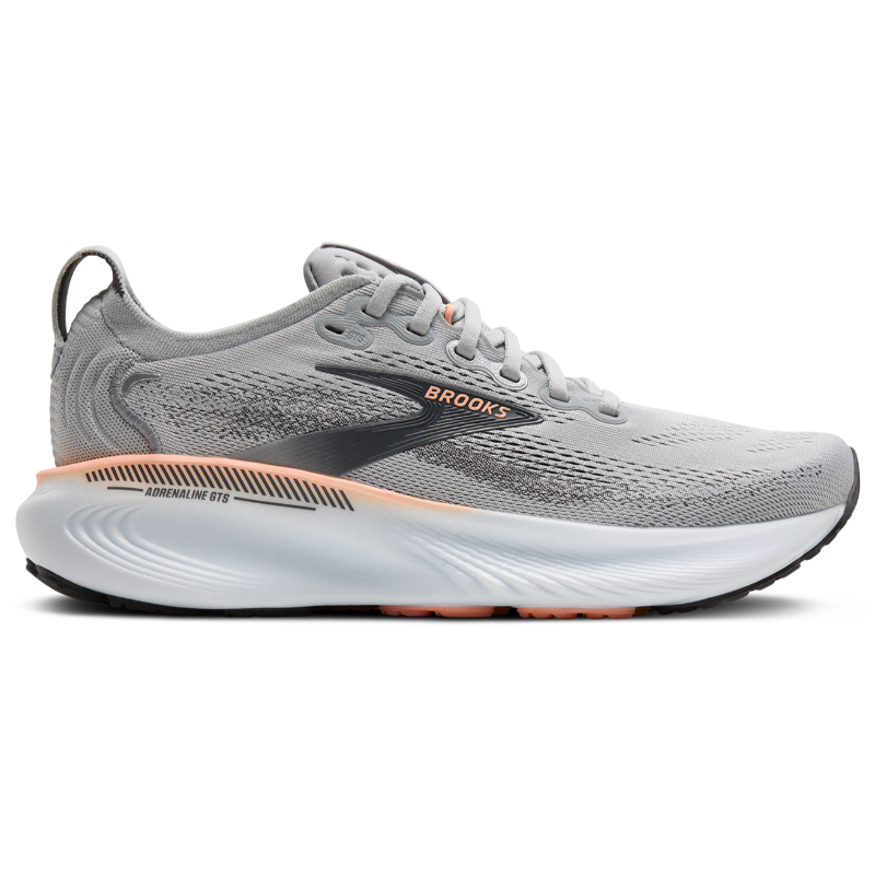 Brooks Adrenaline GTS 25 athletic shoe in gray knit with peach accents and white midsole.